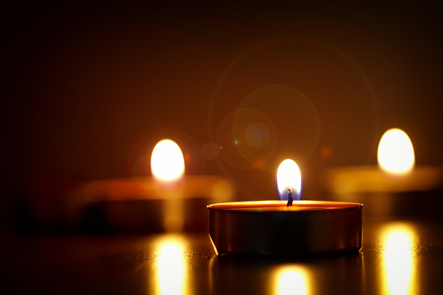 close up photography of lighted candles
